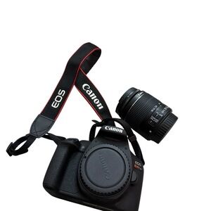 Canon EOS Rebel T7 DSLR Camera with Lens - Black and Red. In new conditions